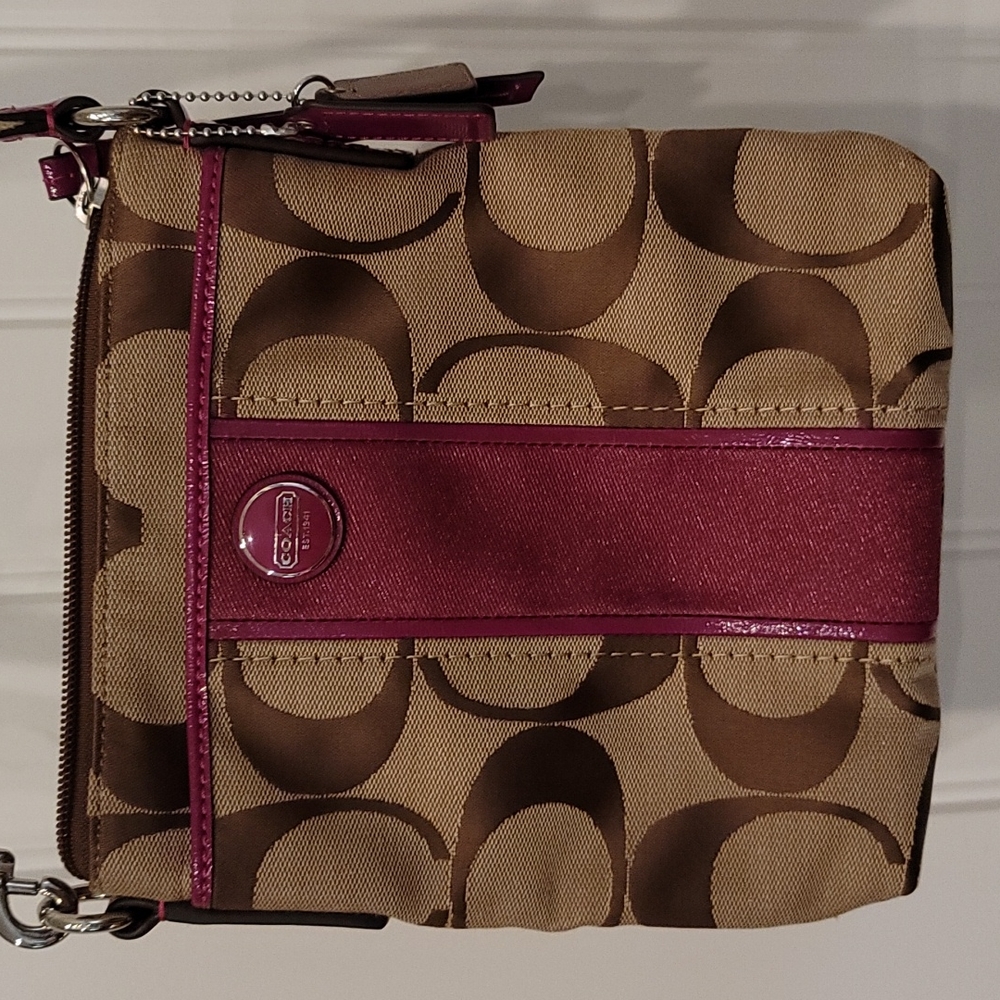 Coach magenta and tan crossbody purse